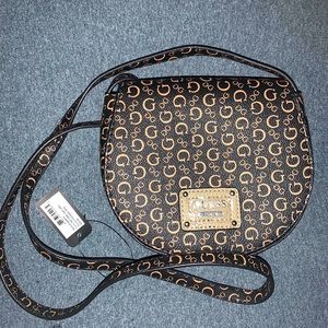 NWT auth guess highway saddle bag handbag